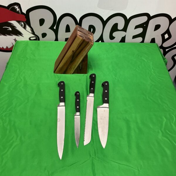 Vintage Taylor’s Eye Witness kitchen knife set with stainless steel blades.