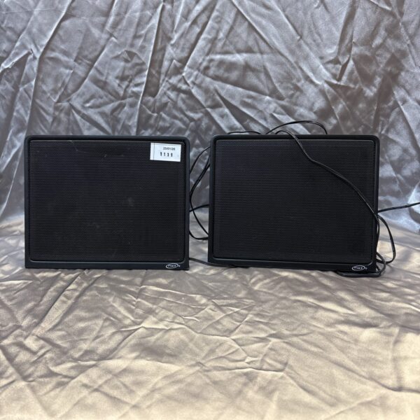 Pair of vintage Teac Nxt flat panel speakers for home audio.