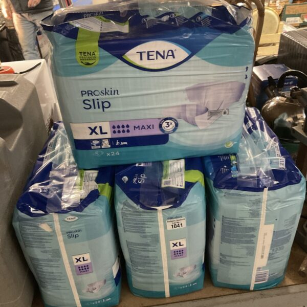 Sealed packs of Tena Pro Skin briefs XL for incontinence protection.