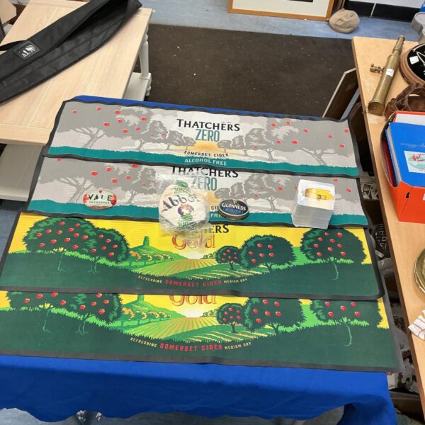 Thatchers Cider bar runners and beer mats on display.
