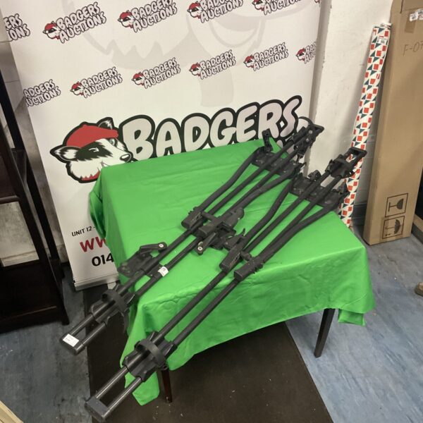 Pair of Thule roof bar cycle carriers for transporting bikes.