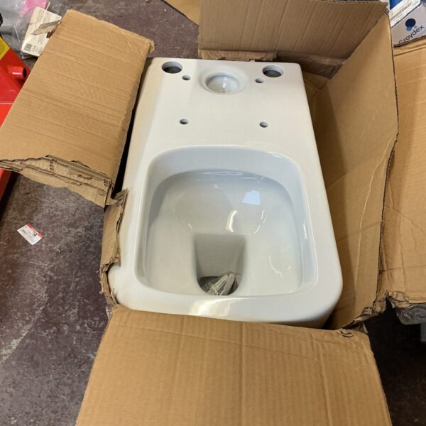 White ceramic toilet bowl, a new bathroom fixture.