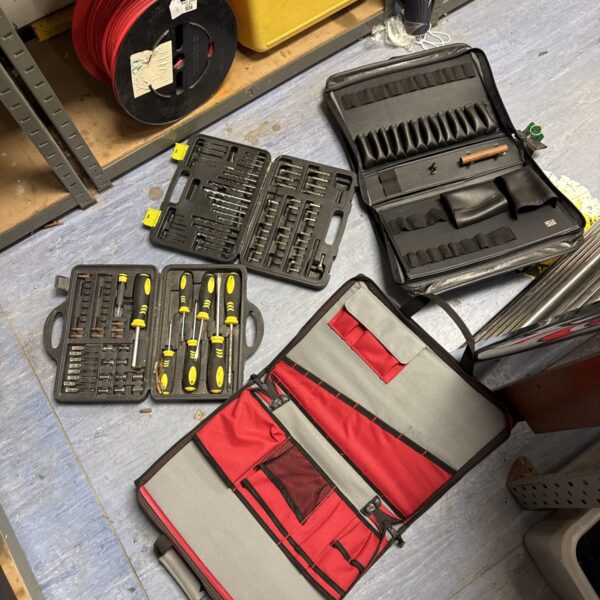 Dark blue tool organiser set with screwdriver and drill bits.
