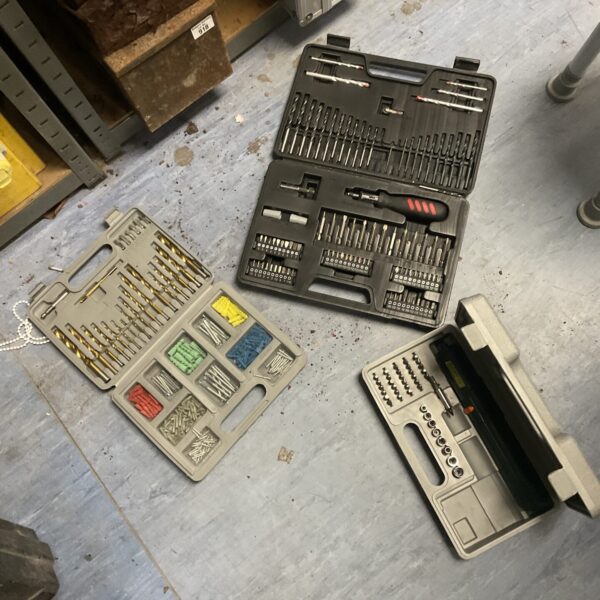Assorted drill and screwdriver bit set in a plastic storage case.