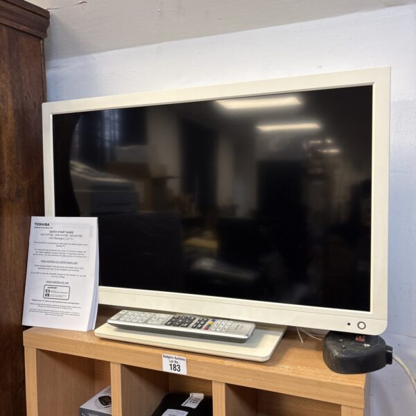 Black Toshiba 24 inch LED television with remote control.