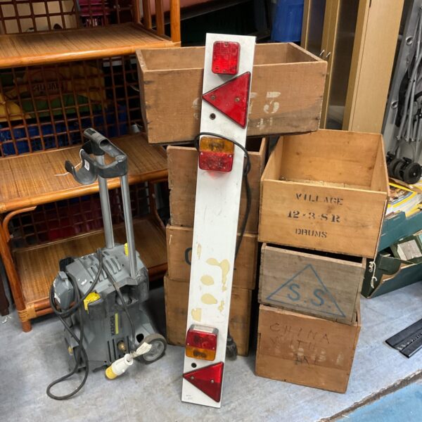 Used trailer light board with multiple lights for towing.
