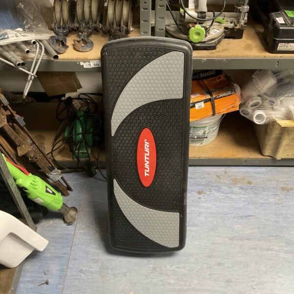 Tunturi height adjustable step platform for fitness exercises.