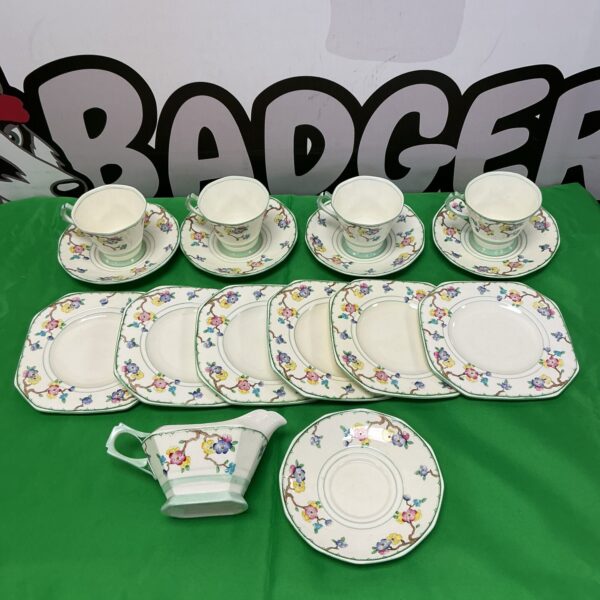 Vintage Tuscan China teacup set with floral design.