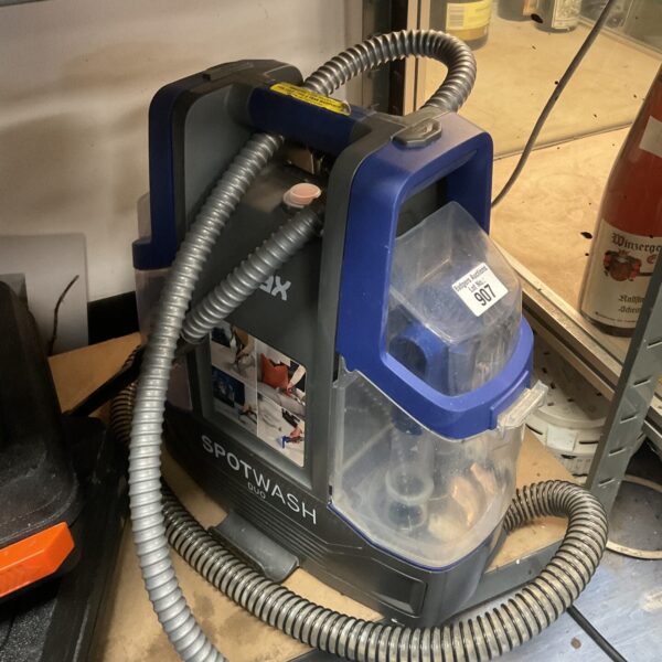 Vax Spotwash Duo steam cleaner with hose attached.