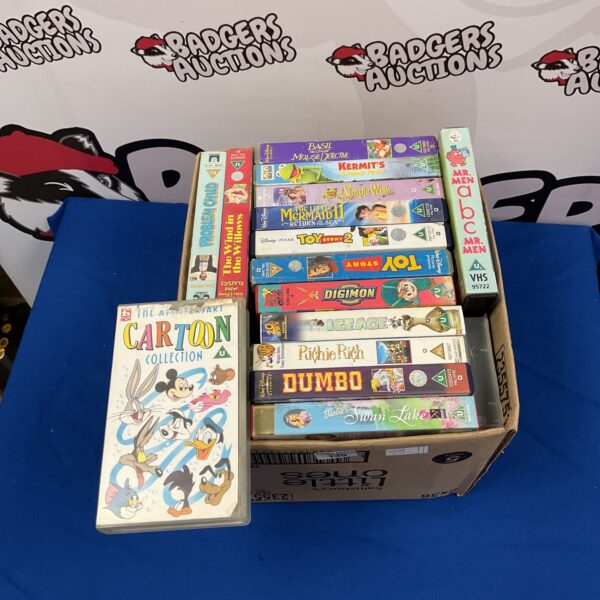 Vintage VHS film collection including Disney and Pixar titles.