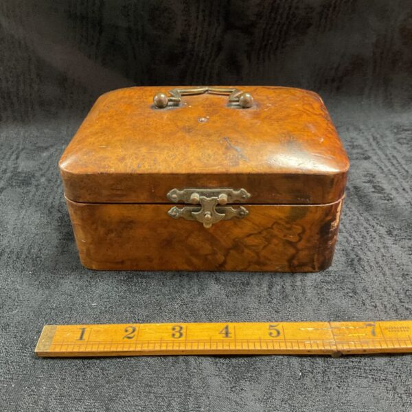 Front view of antique Victorian burr walnut jewellery box.
