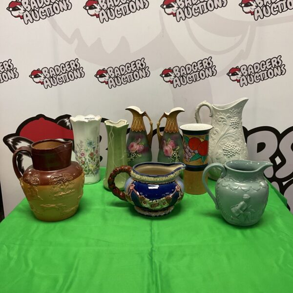 Collection of antique Victorian jugs and vases for collectors.