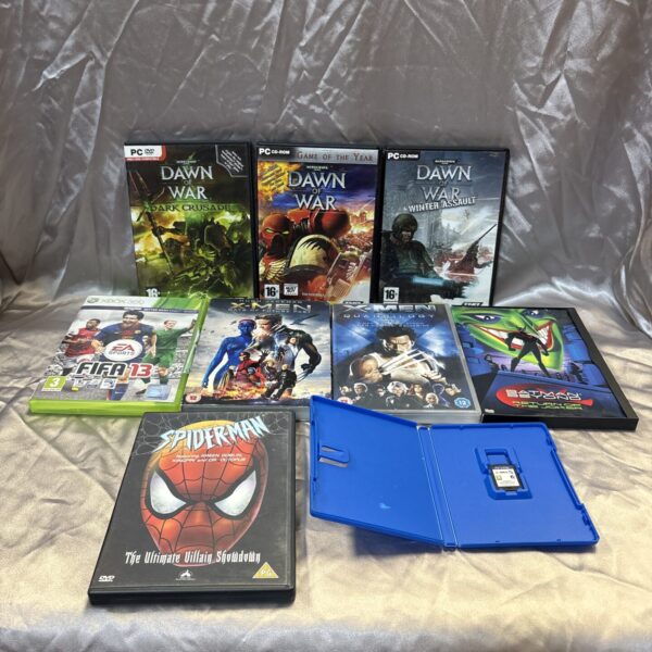 Mixed lot of video games and DVDs for various consoles.