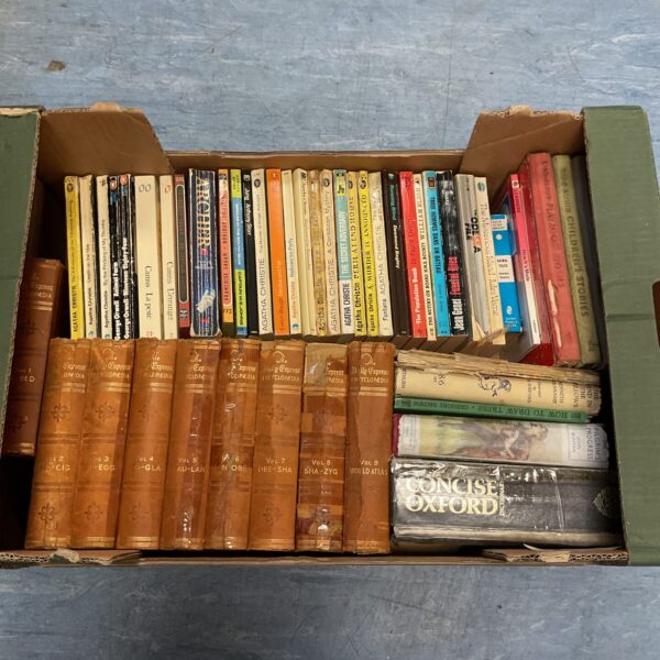 Vintage Agatha Christie book lot on a tray.