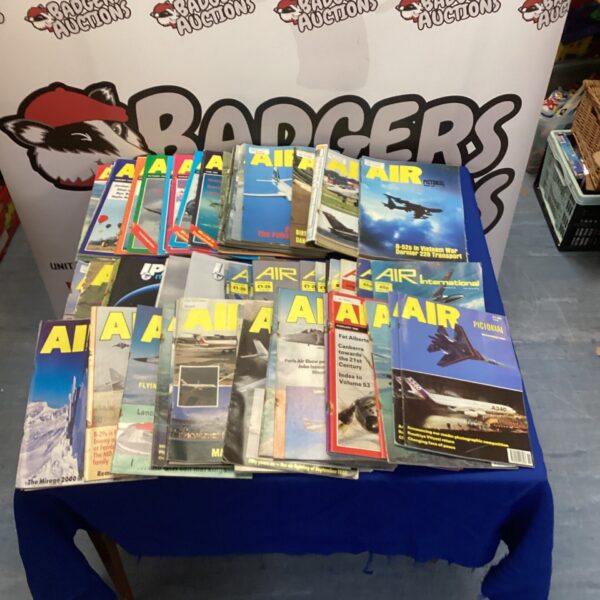 Lot of vintage Air Pictorial magazines for aviation enthusiasts.