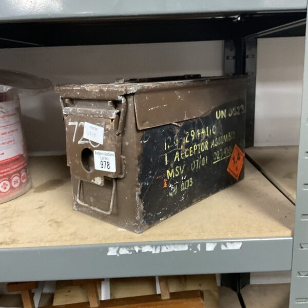 Vintage ammo tin, small metal storage container, side view.