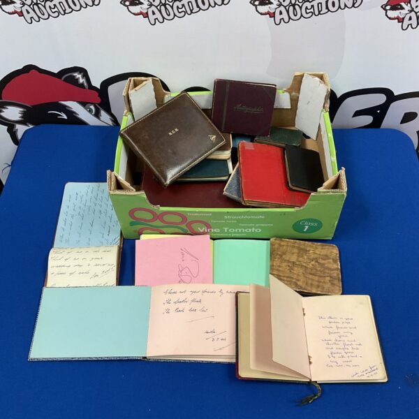Vintage autograph books collection, showcasing various cover styles.