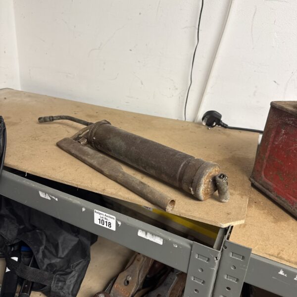 Vintage BDS grease gun, a classic automotive lubrication tool.