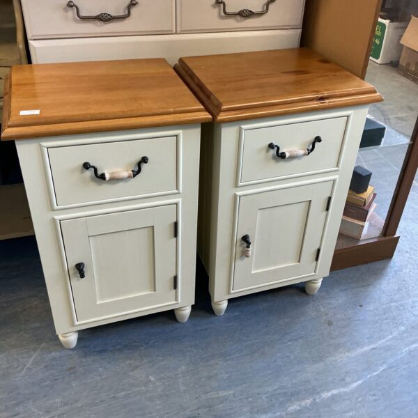 Vintage painted bedside cabinets, a charming bedroom storage solution.