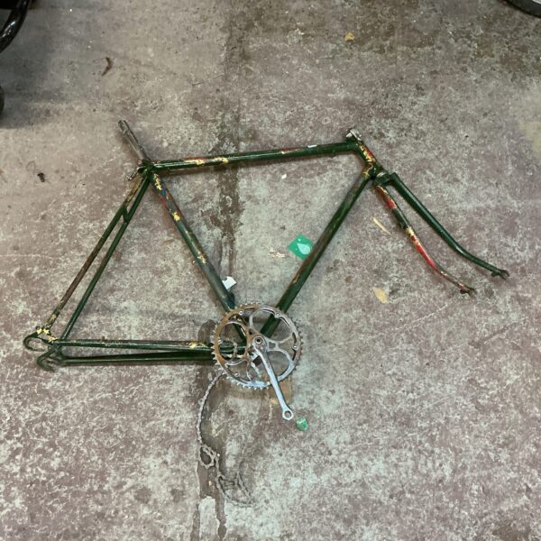 Close-up of a vintage bike frame with corrosion.