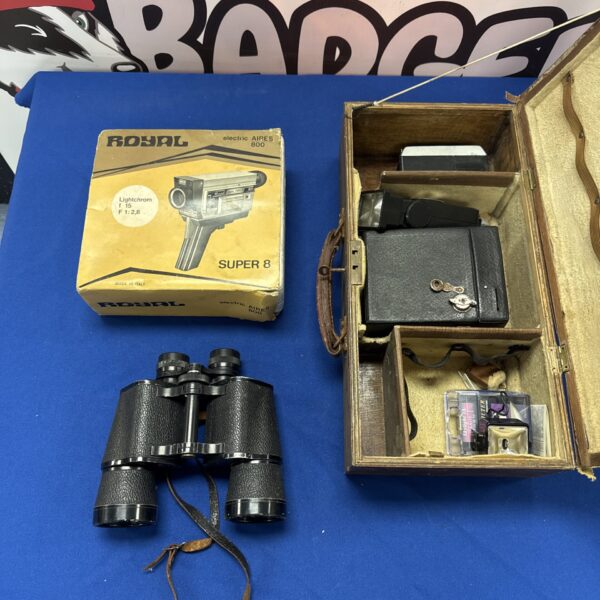 Vintage binoculars and photography equipment in a lot.