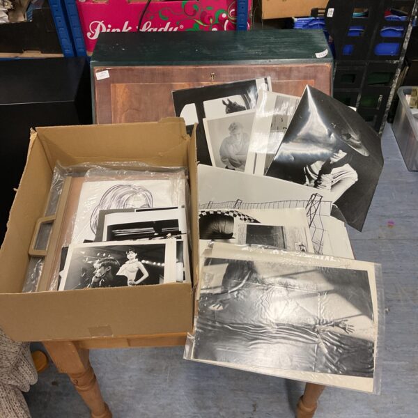 Vintage lot of black and white photograph prints for collectors.