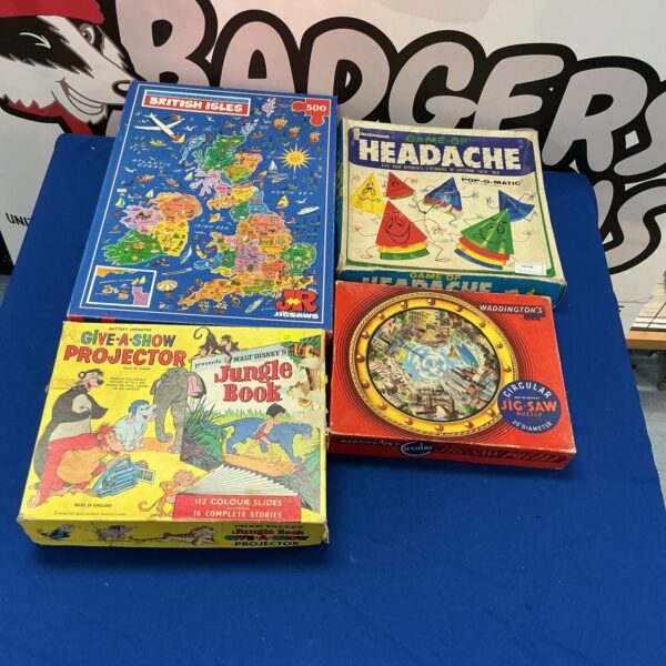 Vintage Headache game and Jungle Book projector, collectible retro toys.