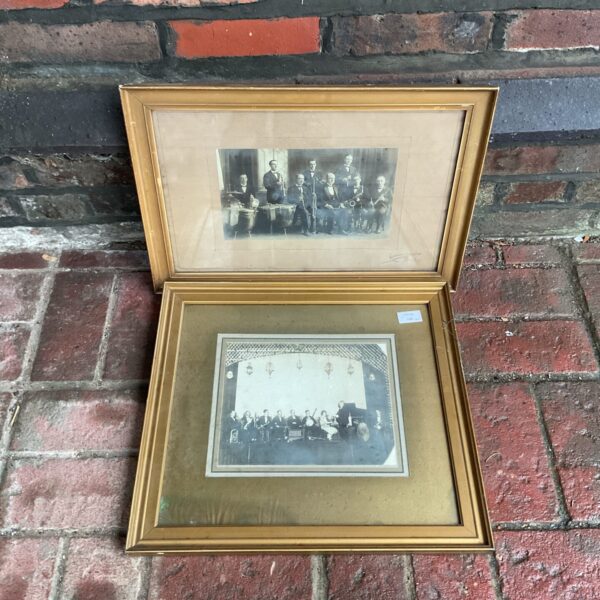 Vintage photograph of a brass band in a gilt frame.