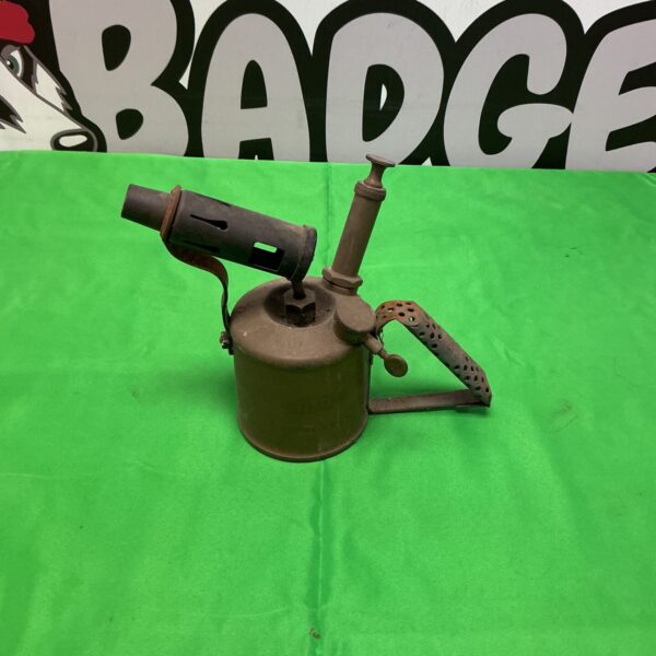 Vintage brass blow torch, antique plumbing tool for collectors.