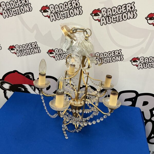 Vintage brass chandelier with delicate glass beaded strands.