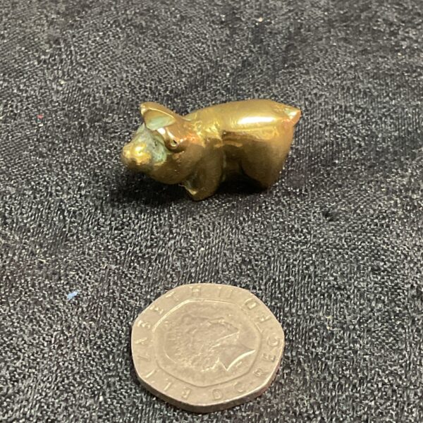 Vintage brass pig ornament, collectible animal figurine.