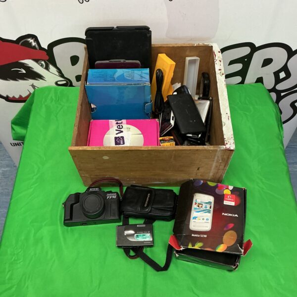 Mixed lot of vintage cameras and mobile phones, including Nokia and Fujifilm.