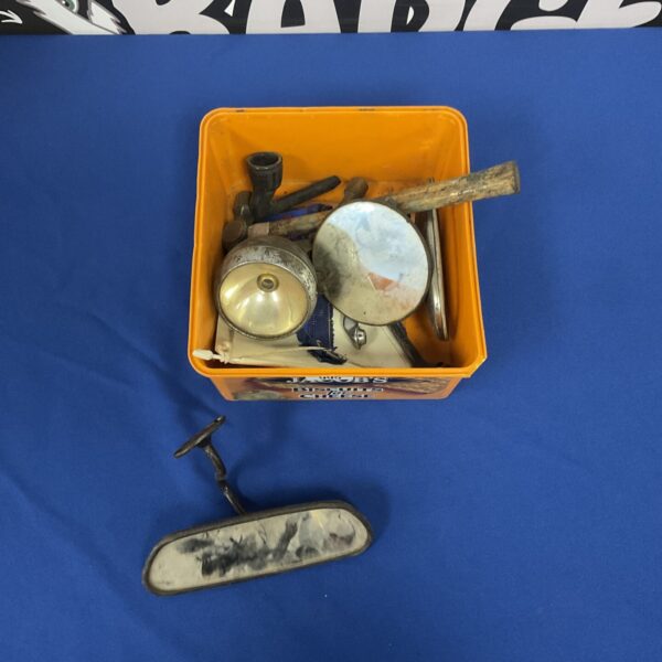 Mixed lot of vintage car parts including a chrome headlamp.