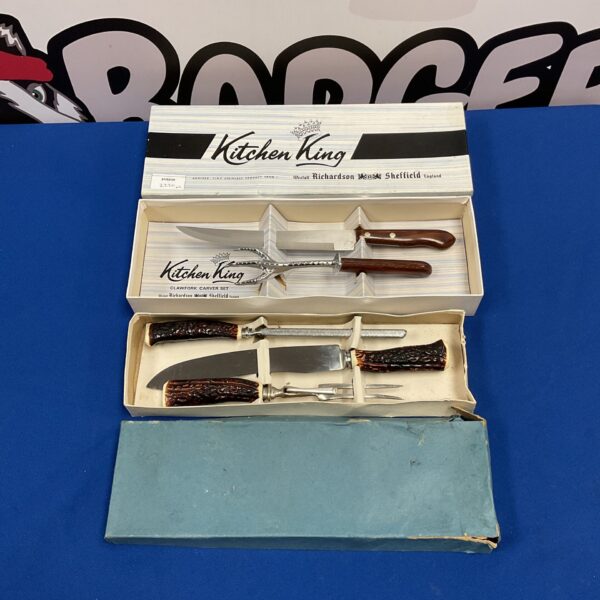 Vintage Kitchen King carving set with horn handles and claw fork.