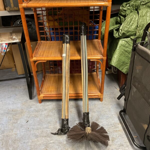Vintage bamboo chimney sweep rods for fireplace cleaning.