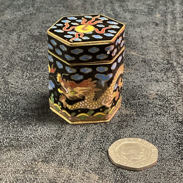 Vintage Chinese cloisonne trinket pot with dragon decoration.