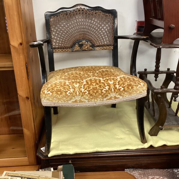 Vintage chinoiserie bedroom chair with black lacquer and oriental design.