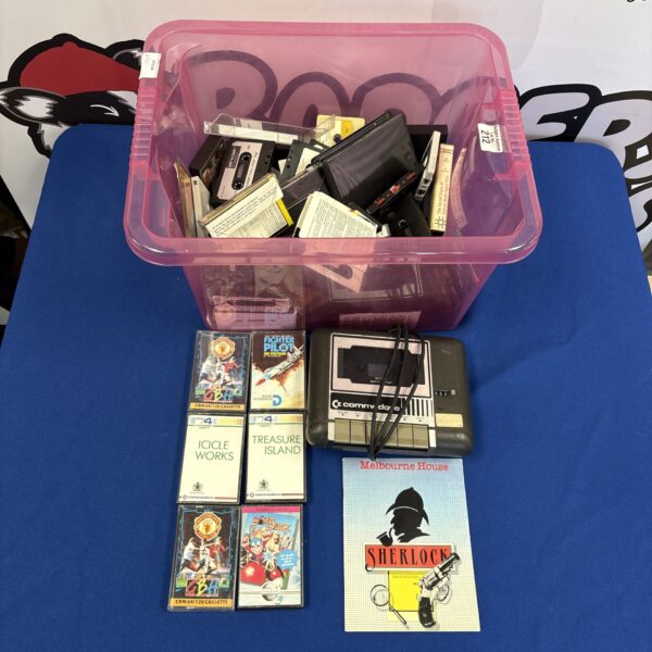 Vintage computer games lot including Commodore 64 and Sinclair Spectrum titles.