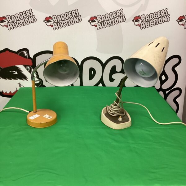 Vintage adjustable desk lamp with flexible neck and weighted base.