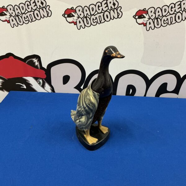 Vintage duck clothes brush, antique composition figure.