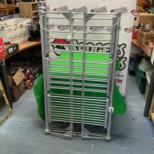 Vintage electric clothes airer for indoor laundry drying.