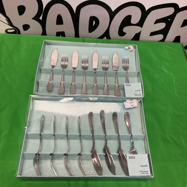 Vintage silver plated fish knives and forks set for dining.
