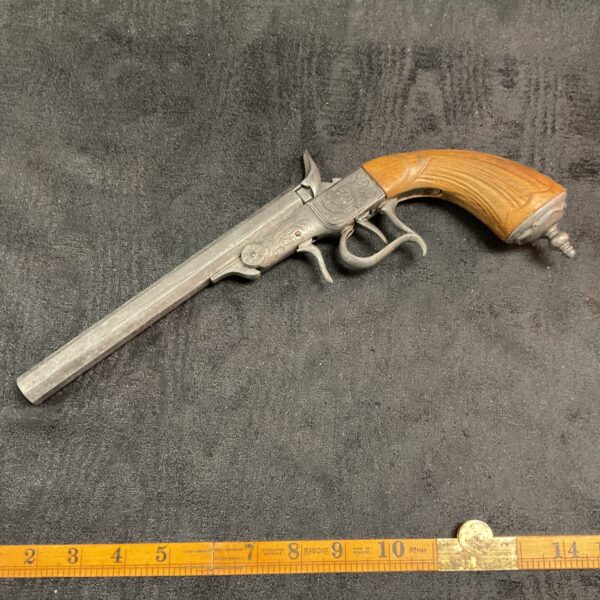 Vintage Flaubert replica pistol, antique decorative wall hanger.