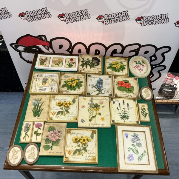 Vintage collection of floral wall plaques for home decor.