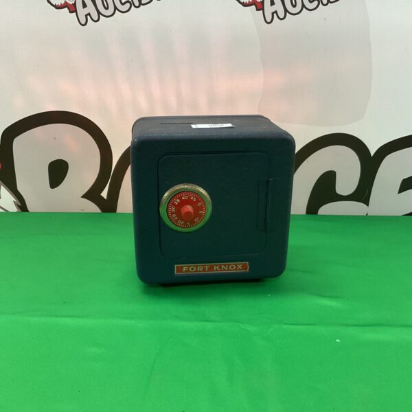 Vintage Fort Knox piggy bank, metal safe money bank collectible.