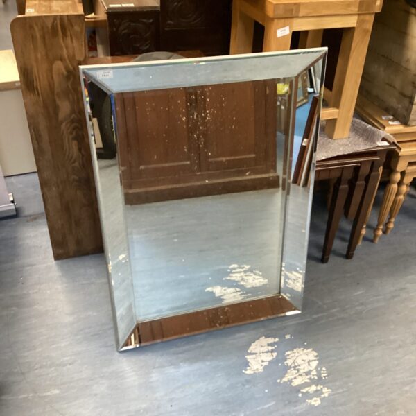 Vintage framed wall mirror for home decor and antique collections.