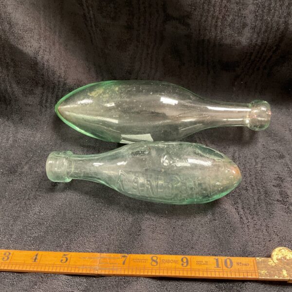 Vintage glass torpedo bottle by North and Randall, Aylesbury.