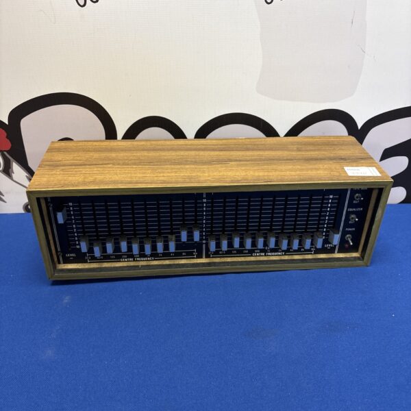 Front view of a vintage graphic equaliser with sliders.