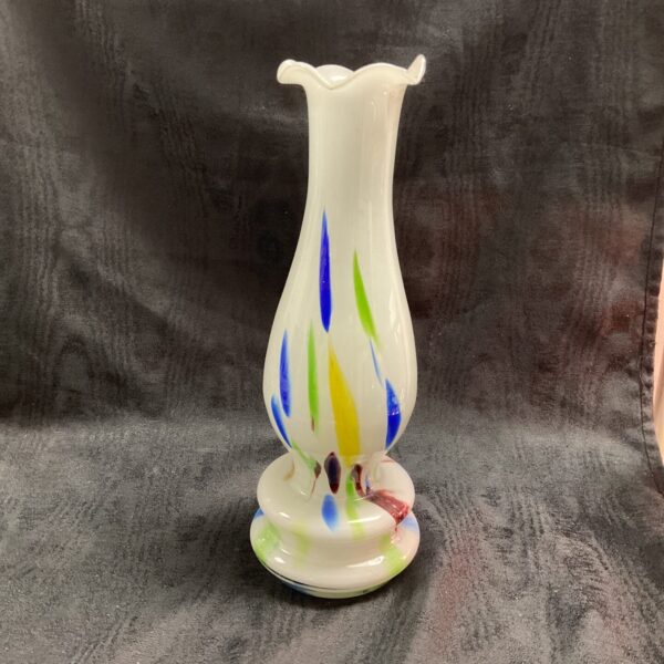 Vibrant vintage hand-blown art glass vase with ruffled edge.