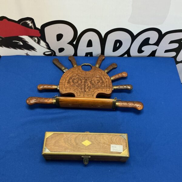 Vintage Indian carved knife and fork set with inlaid wooden box.